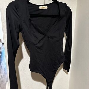 Quisen sleek boutique bodysuit, size S